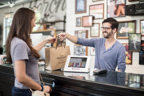 A consumer having a happy shopping experience