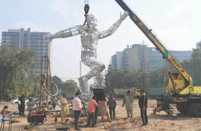 champions-trophy-gaddafi-stadium-running-man-statue